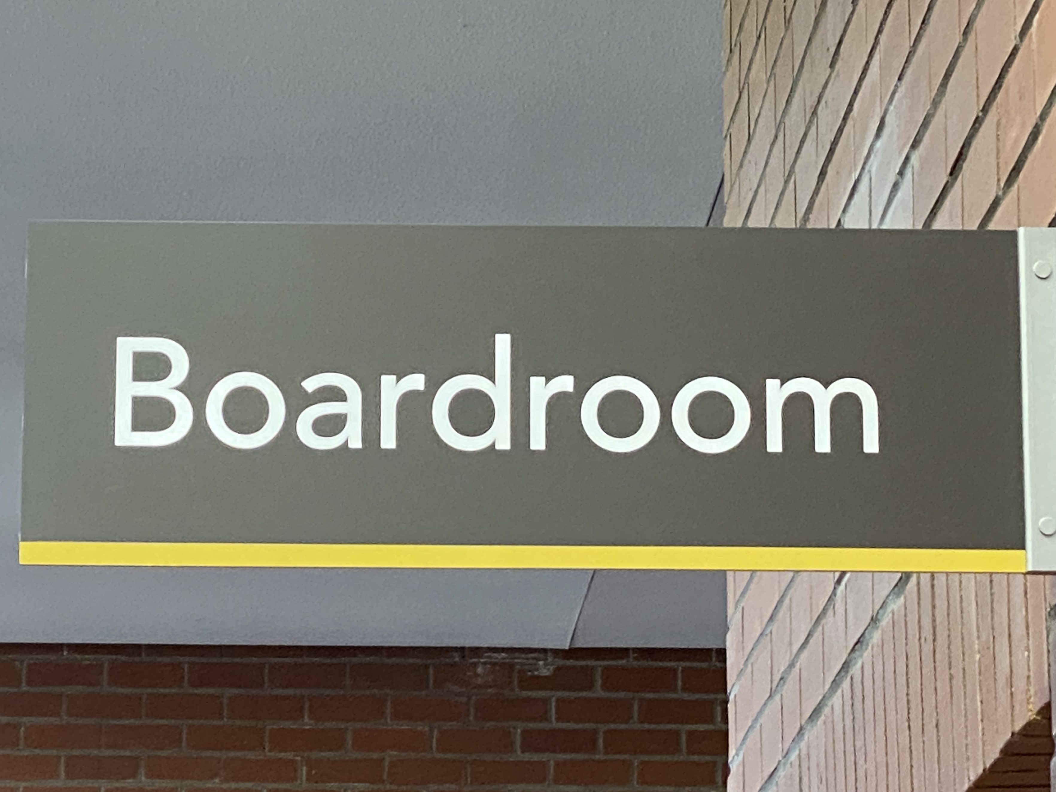 A sign that reads Boardroom